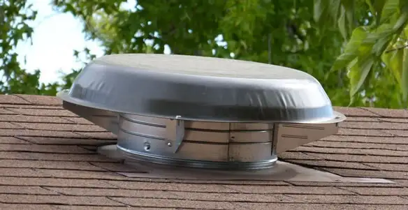 attic fan installation services with low-profile roof ventilation unit in Los Angeles, CA