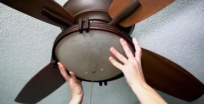 Ceiling fan repair and reinstallation on ceiling mount in Los Angeles, CA