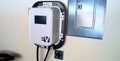 Electric car charger installation with wall-mounted EV charging station in Los Angeles, CA