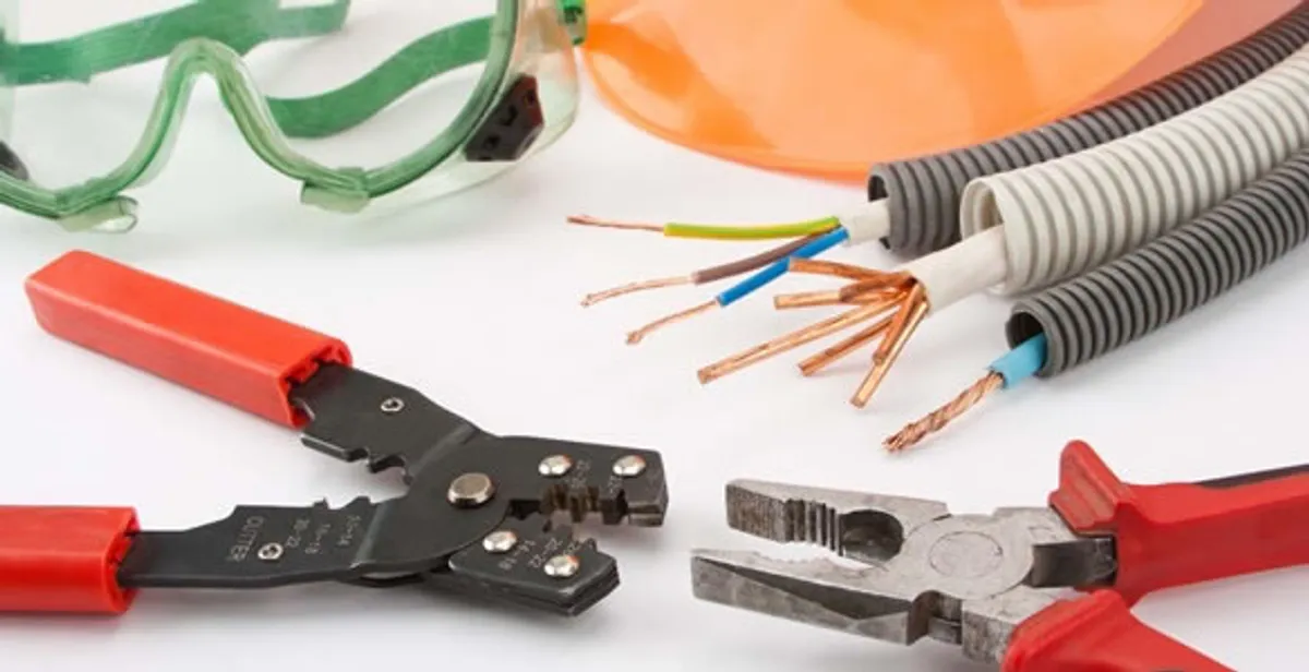 Electrical wiring repair with professional tools and safety equipment in Downey, CA