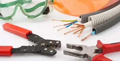 Electrical wiring repair with professional tools and safety equipment in Lynwood, CA