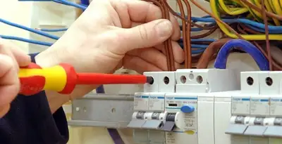 electrician services performing professional electrical panel wiring and connections in Los Angeles, CA