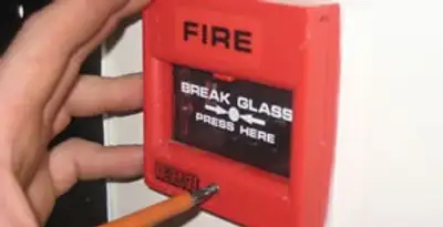fire alarm installation service showing manual fire alarm pull station installed by licensed electricians in Los Angeles, CA