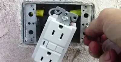 gfci circuits service showing installation of a ground fault circuit interrupter outlet by licensed electricians in Los Angeles, CA