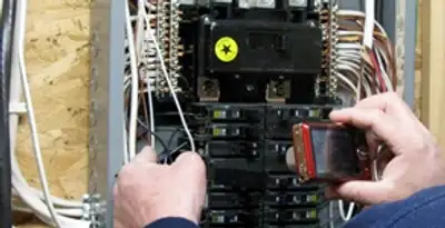Home electrical inspection of circuit breaker panel by licensed electrician in Los Angeles, CA