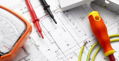 licensed electrician planning and testing electrical systems using professional tools in Los Angeles, CA