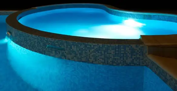 pool light installation and repair services highlighting illuminated pool interior lighting in Los Angeles, CA