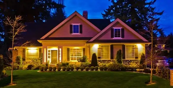security light installation services illuminating a residential exterior at night in Los Angeles, CA