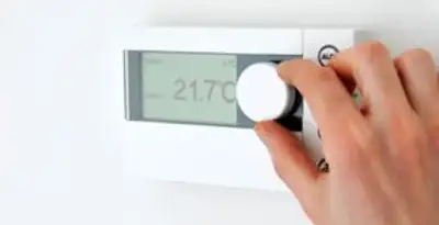 Thermostat installation service with professional adjusting temperature control in Los Angeles, CA