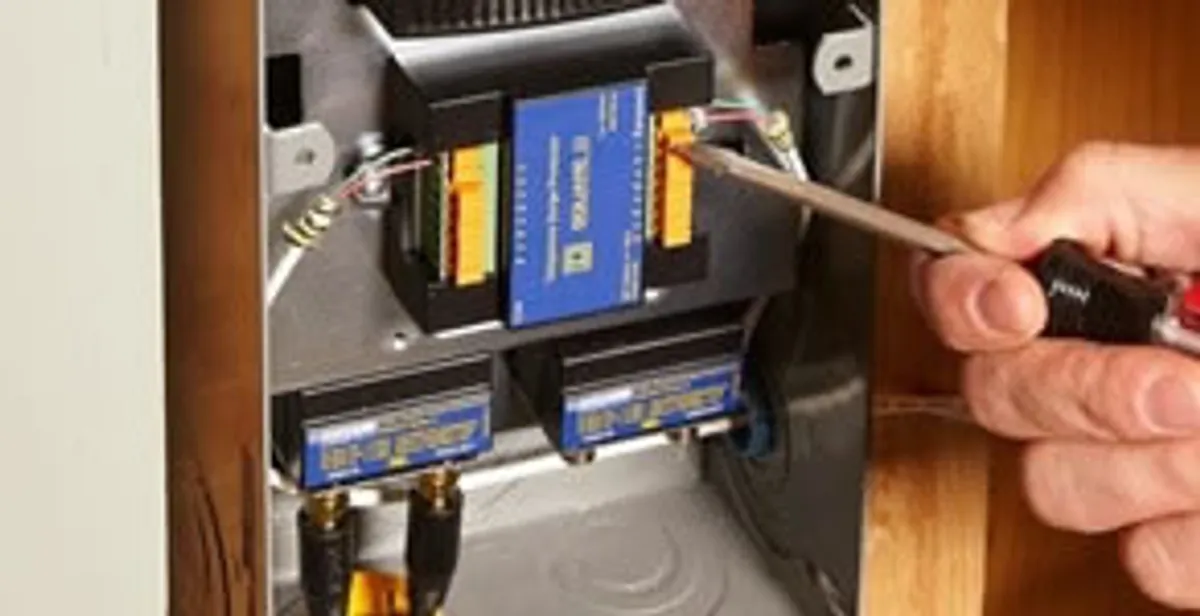 Whole home surge protection device being installed by a licensed electrician to protect electrical systems in Los Angeles, CA