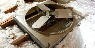 whole house fan installation services with attic-mounted ventilation unit in Los Angeles, CA
